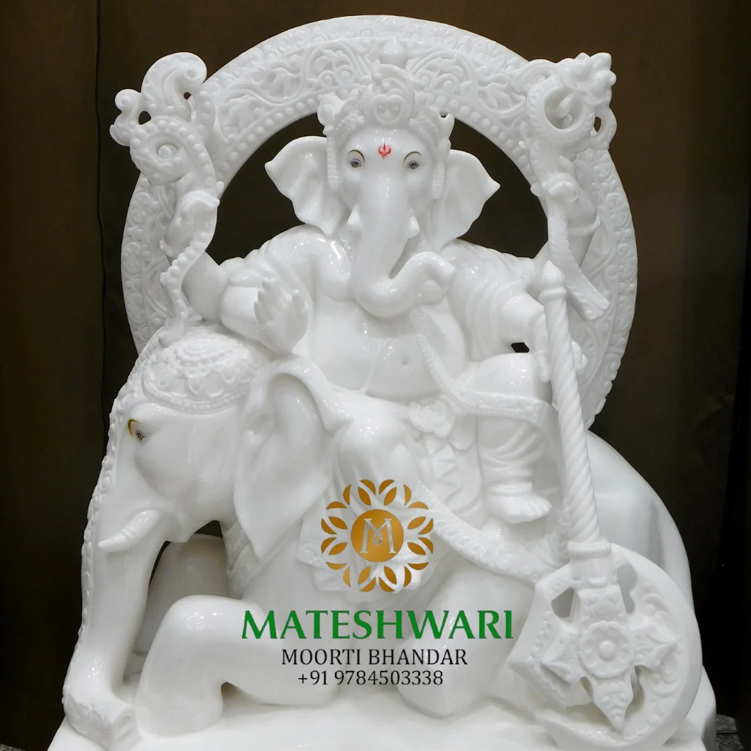shree-gajanand-white-marble-ganesh-seated-on-elephant-with-ornamental-arch