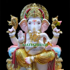 Suvarnaroop with Golden Attire, Soft Pink Accents and Regal Seated Presence