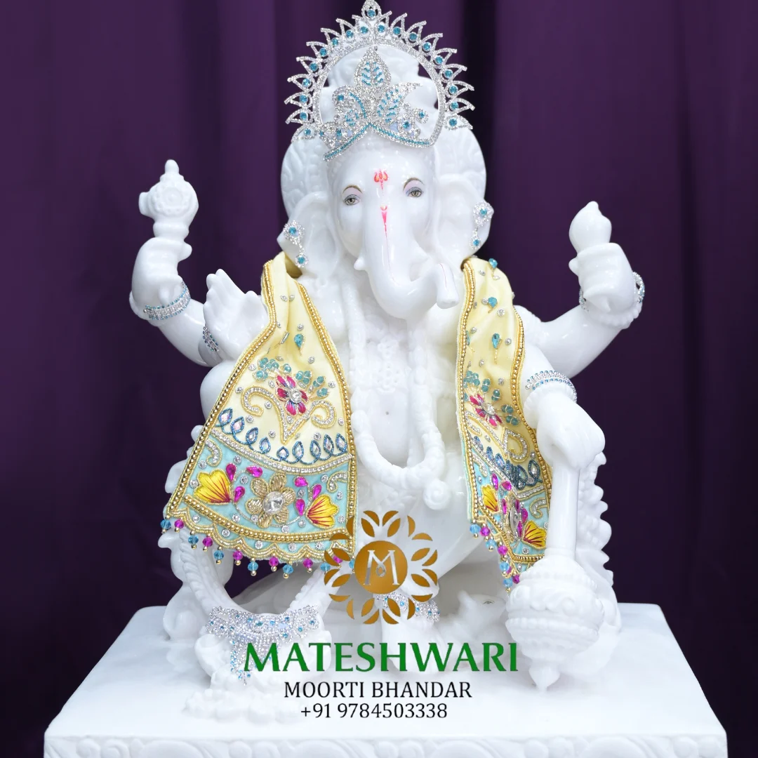 four-arms-ganpati-bappa-with-gada-in-the-hand-crafted-wite-high-quality-white-marble